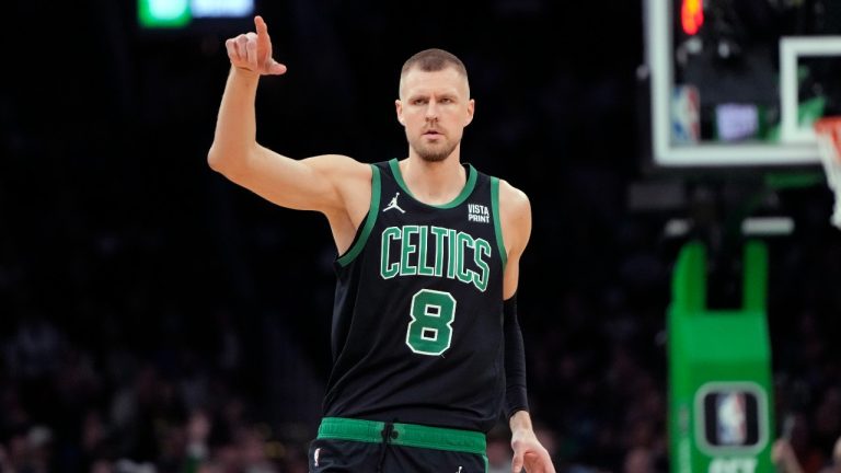 Boston Celtics' Kristaps Porzingis plays against the Dallas Mavericks during the first half of an NBA basketball game. (Michael Dwyer/AP)