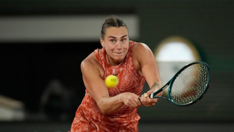 Aryna Sabalenka of Belarus plays a shot against Spain's Paula Badosa during their third round match of the French Open tennis tournament at the Roland Garros stadium in Paris, Saturday, June 1, 2024. (Christophe Ena/AP Photo)