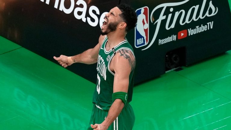 Boston Celtics' Jayson Tatum celebrates after scoring during the first half of Game 5 of the NBA basketball finals against the Dallas Mavericks. (Michael Dwyer/AP)