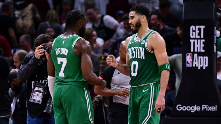 Boston Celtics forward Jayson Tatum congratulates guard Jaylen Brown after they defeated the Cleveland Cavaliers in Game 4 of an NBA basketball second-round playoff series, Monday, May 13, 2024, in Cleveland. (David Dermer/AP Photo)