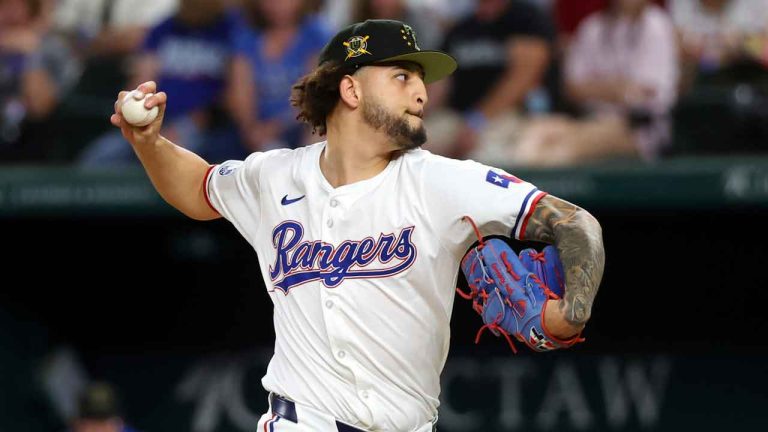 Texas Rangers relief pitcher Yerry Rodriguez (57) delivers against the Los Angeles Angels in the 12th inning of a baseball game. (Richard W. Rodriguez/AP)