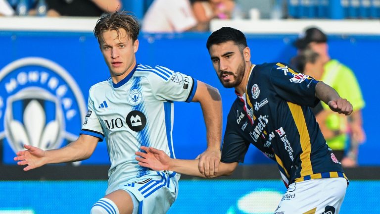 CF Montreal's Bryce Duke, left, and Atletico de San Luis' Aldo Cruz challenge for the ball during first half Leagues Cup soccer action in Montreal, July 30, 2024. (THE CANADIAN PRESS/Graham Hughes)