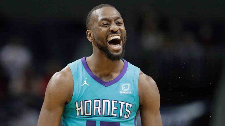 Charlotte Hornets guard Kemba Walker (15) reacts after making a basket against the Washington Wizards during the second half of an NBA basketball game in Charlotte, N.C., Friday, Feb. 22, 2019. (Chuck Burton/AP)