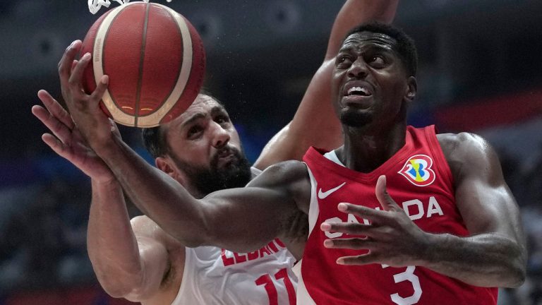 Canada forward Melvin Ejim (3) drives against Lebanon forward Ali Haidar (11) during the Basketball World Cup group H match between Canada and Lebanon at the Indonesia Arena stadium in Jakarta, Indonesia Sunday, Aug. 27, 2023. (Dita Alangkara/AP) 