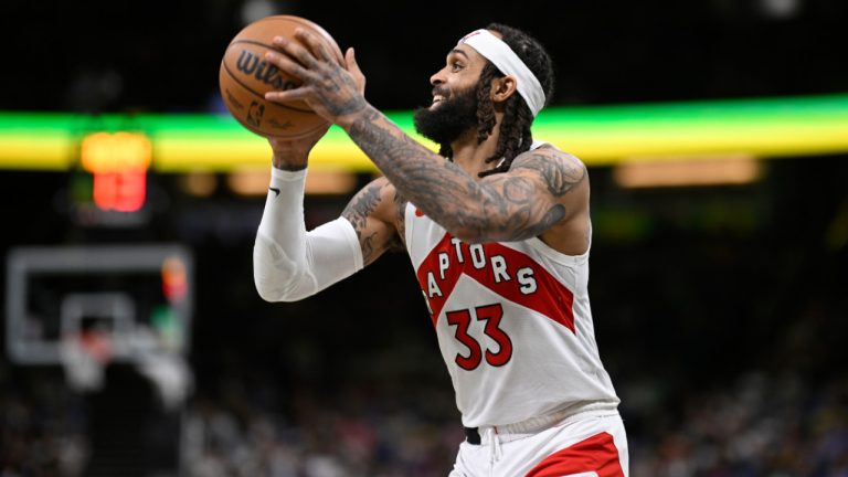 Toronto Raptors guard Gary Trent Jr. (33) goes up to shoot during the second half of an NBA basketball game against the Orlando Magic, Sunday, March 17, 2024, in Orlando, Fla. (AP Photo/Phelan M. Ebenhack) 