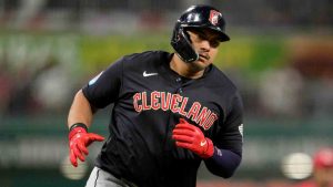 Cleveland Guardians' Josh Naylor gestures as he rounds the bases after hitting a solo home run in the eighth inning of a baseball game against the Cincinnati Reds in Cincinnati, Tuesday, June 11, 2024. (Jeff Dean/AP)