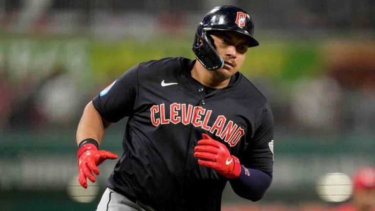 Cleveland Guardians' Josh Naylor gestures as he rounds the bases after hitting a solo home run in the eighth inning of a baseball game against the Cincinnati Reds in Cincinnati, Tuesday, June 11, 2024. (Jeff Dean/AP)