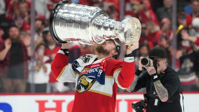 Florida Panthers right wing Vladimir Tarasenko kisses the Stanley Cup trophy after defeating the Edmonton Oilers in Game 7 of the NHL hockey Stanley Cup Final, Monday, June 24, 2024, in Sunrise, Fla. (Wilfredo Lee/AP) 