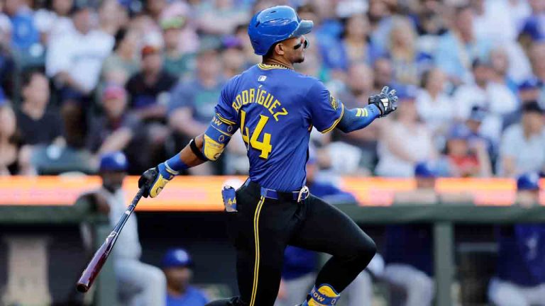 Seattle Mariners' Julio Rodriguez hits a single against the Toronto Blue Jays during the third inning in a baseball game, Friday, July 5, 2024, in Seattle. (John Froschauer/AP)