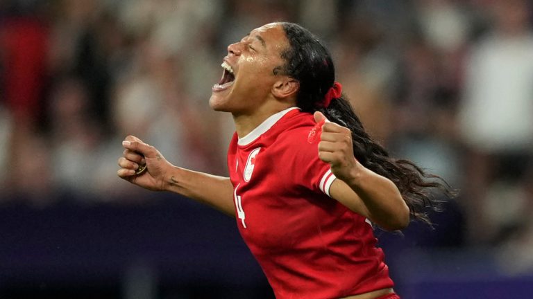 Canada's Asia Hogan-Rochester celebrates after her side won the women's quarterfinal Rugby Sevens match between France and Canada at the 2024 Summer Olympics, in the Stade de France, in Saint-Denis, France, Monday, July 29, 2024.. (Tsvangirayi Mukwazhi/AP) 