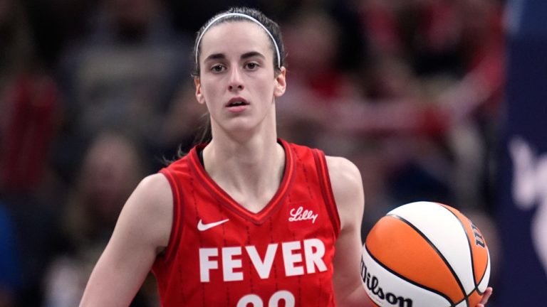 Indiana Fever's Caitlin Clark dribbles during the second half of a WNBA game against the New York Liberty, July 6, 2024, in Indianapolis. (AP Photo/Darron Cummings)