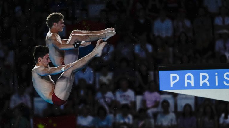 Canada's Rylan Wiens and Nathan Zsombor-Murray compete in the men's synchronised 10m springboard diving final at the 2024 Summer Olympics, Monday, July 29, 2024, in Saint-Denis, France. (Lee Jin-man/AP)