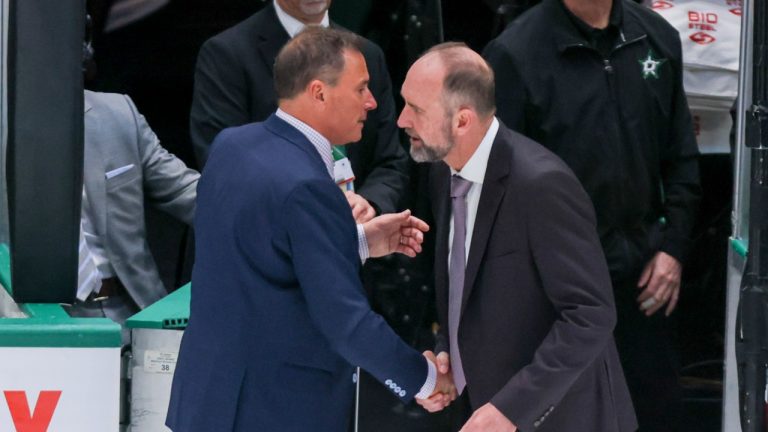 Vegas Golden Knights coach Bruce Cassidy, left, shakes hands with Dallas Stars coach Peter DeBoer. (Gareth Patterson/AP)