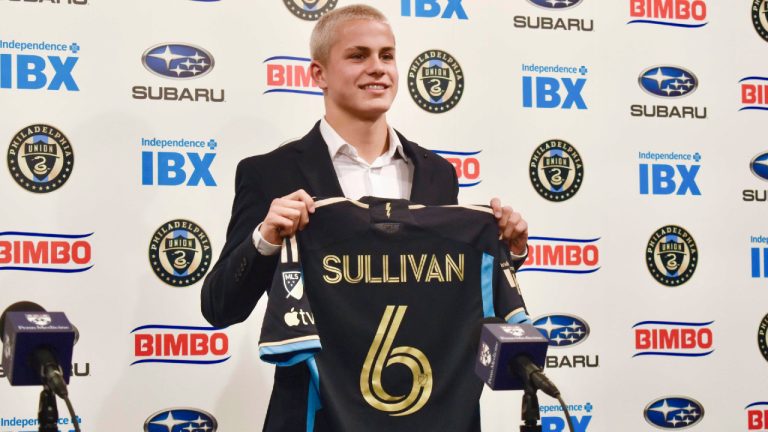 Philadelphia Union player Cavan Sullivan, 14, holds up his No. 6 jersey during an MLS soccer news conference at Subaru Park in Chester, Pa., May 9, 2024. Sullivan became the youngest player to appear in an MLS match on Wednesday night, July 17. (Jonathan Tannenwald/The Philadelphia Inquirer via AP)