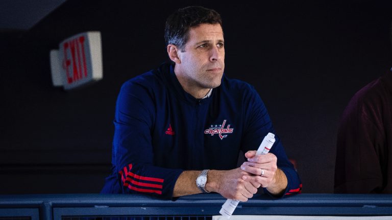 In this image provided by the Washington Capitals, Chris Patrick watches the NHL hockey club's development camp at MedStar Capitals Iceplex in Arlington, Va., Saturday, July 6, 2024. The team on Monday, July 8, named Patrick general manager with Brian MacLellan remaining president of hockey operations. (Zach Guerette/Washington Capitals via AP)