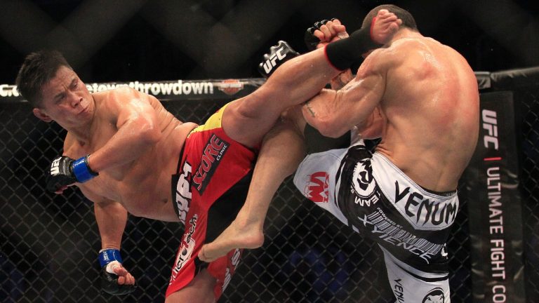 Cung Le, left, kicks Wanderlei Silva during the second round of a UFC 139 middleweight bout in San Jose, Calif. Silva won by TKO in the second round. (Jeff Chiu/AP)