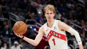 Toronto Raptors guard Gradey Dick drives during the first half of an NBA basketball game against the Detroit Pistons, Wednesday, March 13, 2024, in Detroit. (Carlos Osorio/AP Photo)