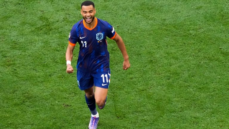 Cody Gakpo of the Netherlands celebrates after scoring the opening goal during a round of sixteen match between Romania and the Netherlands at the Euro 2024 soccer tournament in Munich, Germany, Tuesday, July 2, 2024. (Frank Augstein/AP)