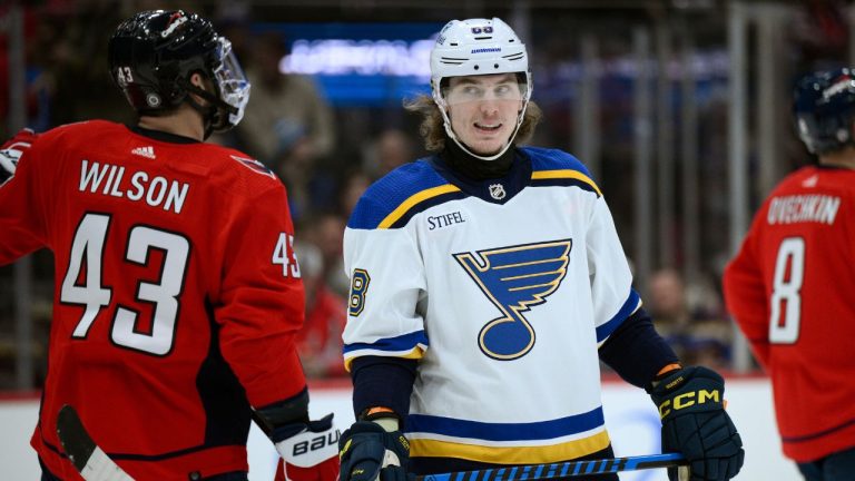 St. Louis Blues center Adam Gaudette looks toward Washington Capitals right wing Tom Wilson during the first period of an NHL hockey game, Thursday, Jan. 18, 2024, in Washington. (Nick Wass/AP Photo)