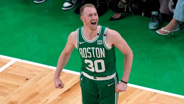 Boston Celtics' Sam Hauser reacts after making a 3-point basket during the first half of Game 5 of the NBA basketball finals against the Dallas Mavericks, Monday, June 17, 2024, in Boston. (Michael Dwyer/AP Photo)