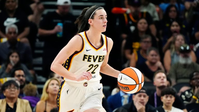 Indiana Fever guard Caitlin Clark dribbles the ball against the Phoenix Mercury during the first half of a WNBA basketball game Sunday, June 30, 2024, in Phoenix. (Ross D. Franklin/AP)