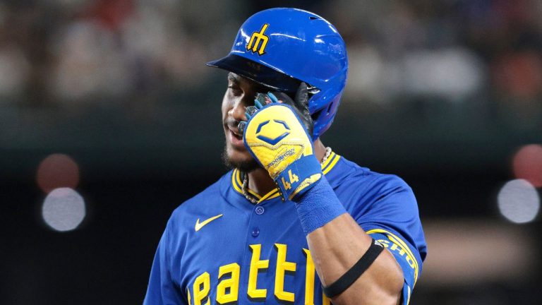 Seattle Mariners' Julio Rodríguez reacts after popping out for the third out during the eighth inning of a baseball game against the Houston Astros, Friday, July 19, 2024, in Seattle. (Jason Redmond/AP Photo)