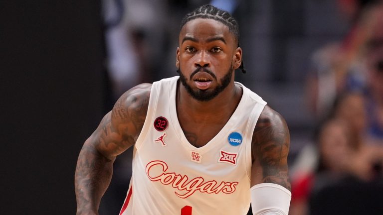 Houston's Jamal Shead dribbles up the court against Duke during a Sweet 16 college game in the NCAA Tournament in Dallas, March 29, 2024. (AP Photo/Tony Gutierrez)