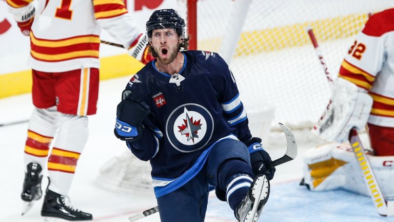 Winnipeg Jets' Jansen Harkins celebrates his goal against the Calgary Flames during an NHL pre-season game Sept. 27, 2023. THE CANADIAN PRESS/John Woods