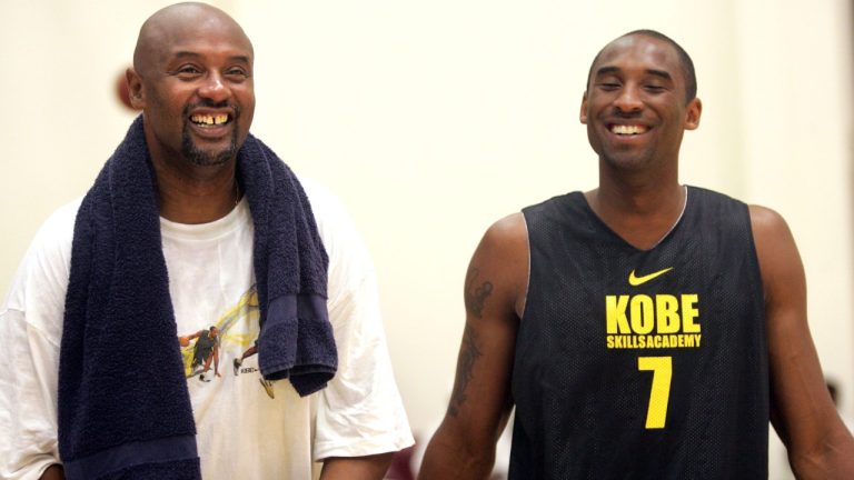 Kobe Bryant, right, has a laugh with his father, Joe "Jellybean" Bryant, prior to participating in a pickup basketball game at the Kobe Bryant Basketball Academy at Loyola Marymount University in Westchester, Calif., on Thursday, July 5, 2007. (Branimir Kvartuc/AP)