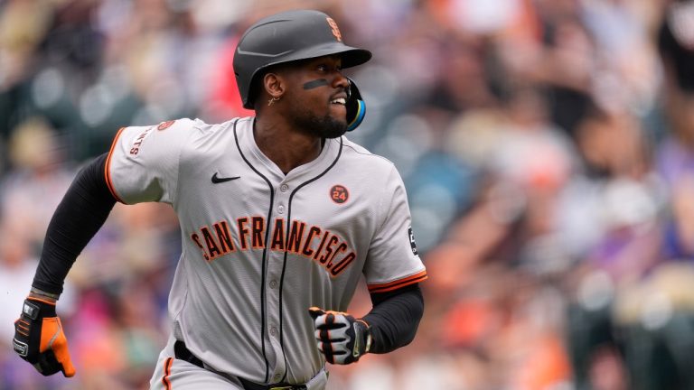 San Francisco Giants' Jorge Soler heads up the first-base line after hitting a solo home run off Colorado Rockies starting pitcher Ryan Feltner in the first inning of a baseball game, Sunday, July 21, 2024, in Denver. (AP Photo/David Zalubowski)