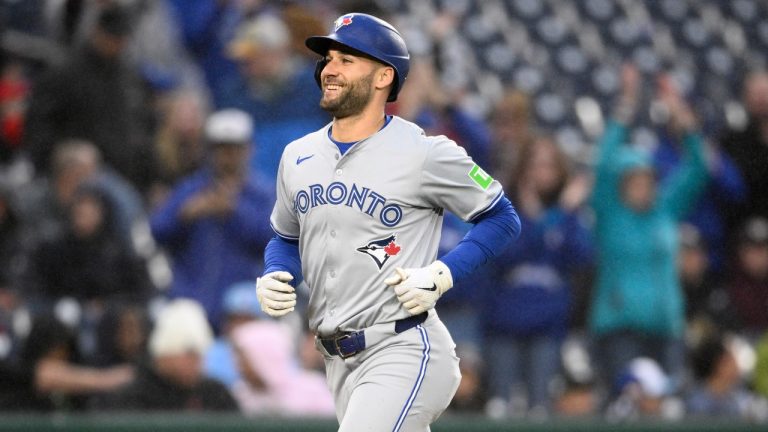 Toronto Blue Jays' Kevin Kiermaier smiles as he rounds the bases on his two-run home run during the eighth inning of a game against the Washington Nationals, May 4, 2024. (AP Photo/Nick Wass)