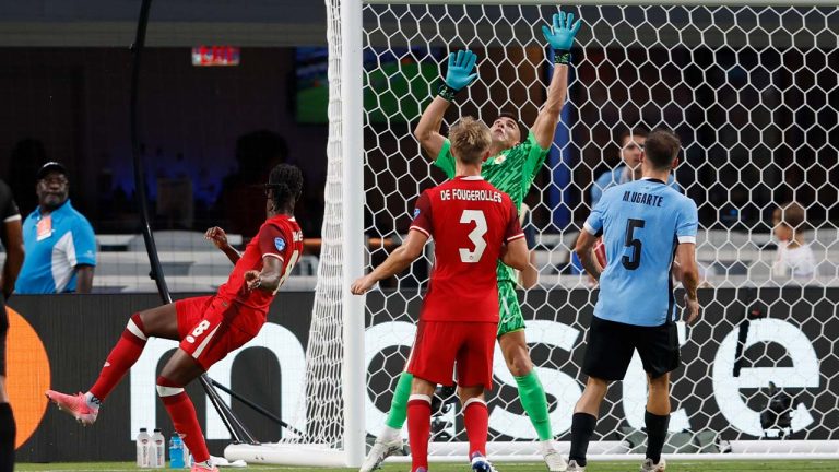 Canada's Ismael Kone (8) scores his side's first goal against Uruguay during the Copa America third place soccer match in Charlotte, N.C., Saturday, July 13, 2024. (Nell Redmond/AP)