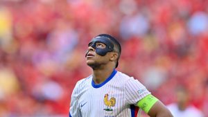 Kylian Mbappe of France looks up during a round of sixteen match between France and Belgium at the Euro 2024 soccer tournament in Duesseldorf, Germany, July 1, 2024. (Marius Becker/dpa via AP, File)