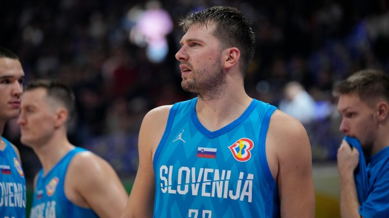 Slovenia guard Luka Doncic (77) celebrates after winning against Italy during the Basketball World Cup classification match in Manila, Philippines, Saturday, Sept. 9, 2023. (AP Photo/Aaron Favila)