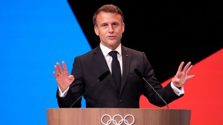 French President Emmanuel Macron speaks after IOC president Thomas Bach announced that the French Alps was named as the 2030 Winter Games host at the 2024 Summer Olympics, Wednesday, July 24, 2024, in Paris, France. (AP Photo/David Goldman)