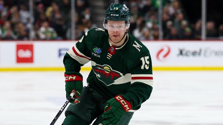 Minnesota Wild centre Mason Shaw skates with the puck during an NHL game against the Ottawa Senators, April 2, 2024. (AP Photo/Matt Krohn)