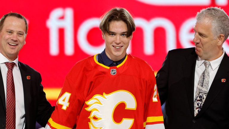 Matvei Gridin poses after being selected by the Calgary Flames during the first round of the NHL draft, June 28, 2024. (AP Photo/Steve Marcus)