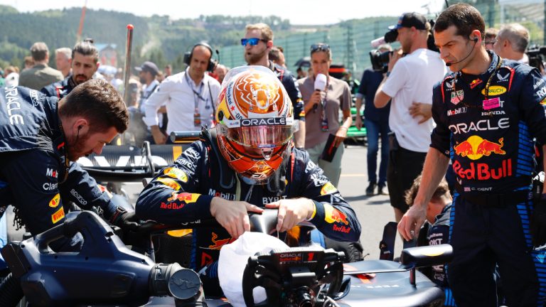 Crew prepare the car of Red Bull driver Max Verstappen of the Netherlands prior to the start of the Formula One Grand Prix at the Spa-Francorchamps racetrack in Spa, Belgium, Sunday, July 28, 2024. (Geert Vanden Wijngaert/AP)