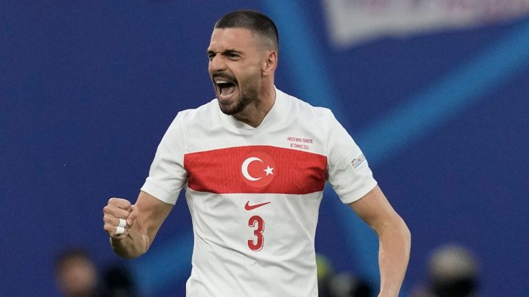 Turkey's Merih Demiral celebrates scoring a goal against Austria during a round of sixteen match at the Euro 2024 tournament, July 2, 2024. (AP Photo/Thanassis Stavrakis)