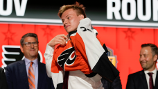 Flyers top prospect Matvei Michkov met by team management at JFK Airport