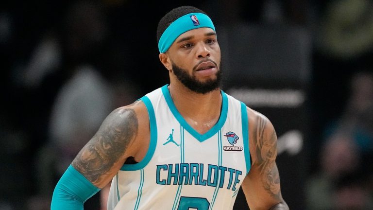 Charlotte Hornets forward Miles Bridges moves down court against the Atlanta Hawks during the first half of an NBA game, April 10, 2024. (AP Photo/Mike Stewart)