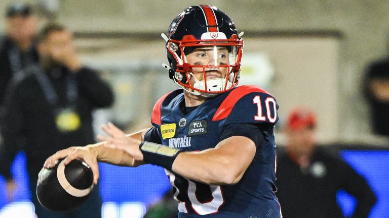 Montreal Alouettes quarterback Davis Alexander (10) sets up to throw during second half CFL football action against the Saskatchewan Roughriders in Montreal, Thursday, July 25, 2024. (Graham Hughes/CP)