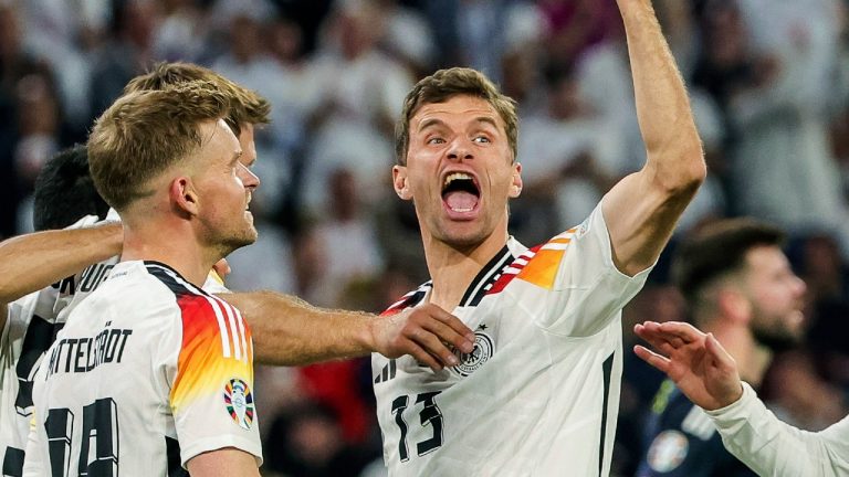 Germany's Thomas Mueller, right, celebrates during the Group A match between Germany and Scotland at the Euro 2024 soccer tournament in Munich, Germany, Friday, June 14, 2024. (Christian Charisius/dpa via AP, File)