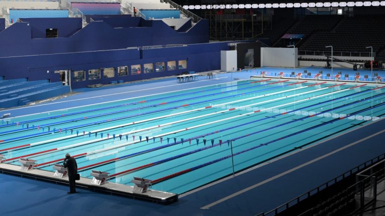 The swimming pool for Olympic competitions is seen in the Paris La Defense Arena in Nanterre, outside Paris, Monday July 5, 2024. (Bertrand Guay/ Pool via AP)