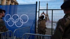 Paris police sealing off Seine River ahead of Olympic opening ceremony