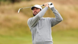 Scottie Scheffler of the United States watches his approach shot into the 11th hole during a practice round ahead of the British Open Golf Championships at Royal Troon golf club in Troon, Scotland, Wednesday, July 17, 2024. (Peter Morrison/AP)