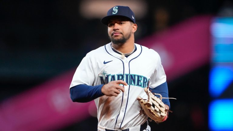 Seattle Mariners left fielder Jonatan Clase jogs on the field during a baseball game against the Cincinnati Reds, Tuesday, April 16, 2024, in Seattle. (Lindsey Wasson/AP)