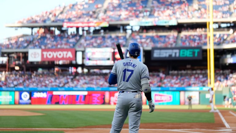 Los Angeles Dodgers' Shohei Ohtani prepares before a game against the Philadelphia Phillies, July 10, 2024. (AP Photo/Matt Slocum)