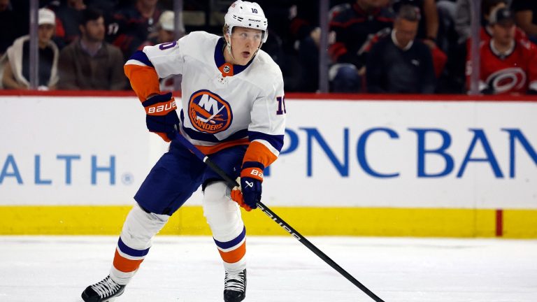 New York Islanders' Simon Holmstrom (10) controls the puck against the Carolina Hurricanes during the first period in Game 2 of an NHL hockey Stanley Cup first-round playoff series in Raleigh, N.C., Monday, April 22, 2024. (Karl B DeBlaker/AP)