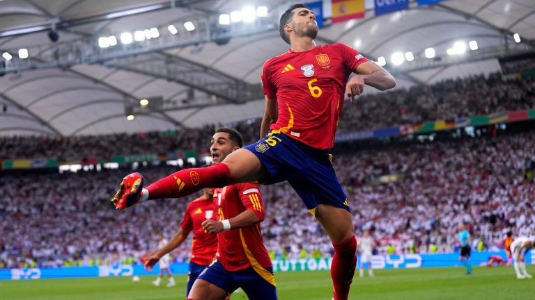 Spain's Mikel Merino celebrates after scoring his sides second goal during a quarter final match between Germany and Spain at the Euro 2024 soccer tournament. (Manu Fernandez/AP)